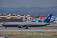 N677UA @ KLAX - United Airlines moments after landing. - by speedbrds