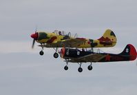 G-YFUT @ EGFH - G-YFUT leading G-CBRH in a formation take-off from Runway 22. - by Roger Winser