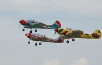 ZU-HOG @ EGFH - Leading G-YAKF and G-YFUT in a formation take-off  - by Roger Winser