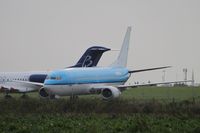 PH-BDP @ EGSH - With logos removed but still in KLM colours. Fokker 100 in back ground. - by Graham Reeve