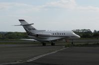 CS-DRE @ EGFH - NetJets Europe's Hawker taxying on the apron for departure - by Roger Winser