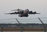 00-0171 @ MCO - C-17A taking off at dusk