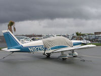 N9252W @ KSQL - 1967 Piper PA-28-235 on visitors ramp and buttoned up before the rain @ San Carlos, CA - by Steve Nation