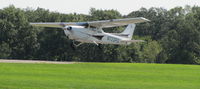 N723PG @ KC77 - Landing at KC77 Popular Grove, IL - by W. R. Lang