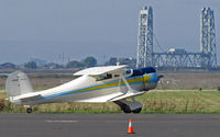 N9115H @ KAPC - Locally-based 1941 Beech D17S taxis for some morning sun and a few touch-and-gos @ Napa County Airport, CA - historic Napa River RR Bridge in background - by Steve Nation