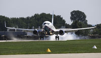 N300AT @ KOSH - EAA AIRVENTURE 2010 - by Todd Royer