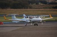 G-PETS @ EGFH - Airways Aircraft Leasing's sleek DA42 Twin Star with newly painted yellow winglets - by Roger Winser