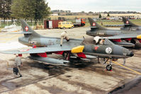 J-4032 @ EGVA - Hunter F.58 of the Patrouille Suisse aerobatic display team on the flight-line at the 1993 Intnl Air Tattoo at RAF Fairford. - by Peter Nicholson