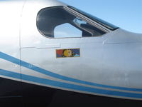 N942TW @ KHWD - Close-up of cockpit logo on 2005 Pilatus PC-12/45 @ Hayward, CA - by Steve Nation