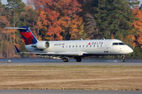 N8631E @ ORF - Delta Connection (Pinnacle Airlines) N8631E from Detroit Metro Wayne County Airport (KDTW) landing RWY 23. - by Dean Heald