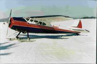N2187C @ 21M - Cessna 195 on Skiis - by Currier