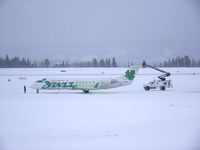 C-FXMY @ CYXY - On the ramp at YXY, being de-iced for the return flight to YVR - by Murray Lundberg