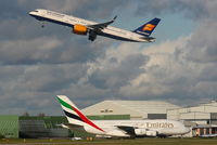 TF-FIO @ EGCC - Icelandair B757 departing from RW23R as Emirates A380 taxis to its stand - by Chris Hall