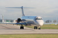 OY-KHG @ EGCC - Scandinavian MD-82 taxing to the RW23L threshold - by Chris Hall