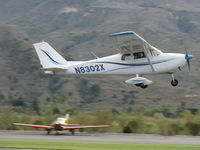 N8302X @ SZP - 1961 Cessna 172C, Continental O-300 145 Ho, takeoff climb Rwy 22 - by Doug Robertson