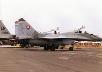 6930 @ MHZ - Fulcrum A of 31st Fighter Wing [31 SLK] of the Slovak Air Force on the flight-line at the 1998 RAF Mildenhall Air Fete. - by Peter Nicholson