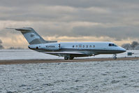 N349AK @ EGGW - Hawker Beechcraft Corp HAWKER 4000, c/n: RC-42 at a very wintery Luton - by Terry Fletcher