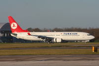TC-JHB @ EGCC - Turkish Airlines B737 landing on RW05L - by Chris Hall