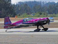 N46EX @ KWVI - Vicki Benzing arriving in her 1993 Extra EA-300/S FESTO  @ 2010 Watsonville Fly-in - by Steve Nation