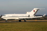 M-FAHD @ EGGW - Prime Air Corporation B727 touching down on RW26 - by Chris Hall