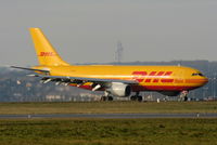 EI-OZH @ EGGW - DHL A300 taxying to the cargo apron after arriving on RW26 - by Chris Hall