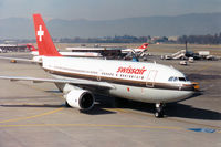 HB-IPF @ GVA - A310-322 of Swissair taxying to the terminal at Geneva in March 1993. - by Peter Nicholson