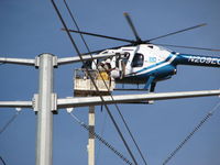 N209EC - Power line Work - by Tyler Stewart