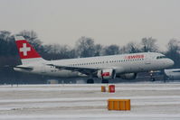 HB-IJI @ EGCC - Swiss A320 landing on RW05L - by Chris Hall