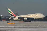A6-EDG @ EGCC - Emirates A380 landing on RW05L - by Chris Hall