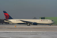N189DN @ EGCC - Delta B767 departing from RW05L - by Chris Hall