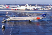 LN-RLF @ EGCC - Scandinavian MD-82 pushing back from its gate - by Chris Hall