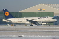 D-AILW @ EGCC - Lufthansa A319 landing on RW05L - by Chris Hall