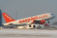 G-EZBY @ EGCC - easyJet A319 departing from RW05L - by Chris Hall