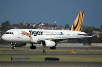 VH-VNB @ YSSY - Catch this Tiger by the tail - by Bill Mallinson
