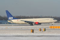 LN-RRU @ EGCC - Scandinavian B737 landing on RW05L - by Chris Hall
