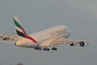 A6-EDG @ EGCC - Emirates A380 climbing away from RW05L - by Chris Hall