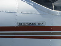 N8577C @ SZP - 1976 Piper PA-32-300 CHEROKEE SIX, Lycoming TIO-540 310 Hp Turbo upgrade, logo - by Doug Robertson