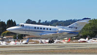 N427TM @ KWVI - Aircraft Holdings Raytheon Hawker 800XP landing at WVI during 2010 Watsonville Fly-In - by Steve Nation