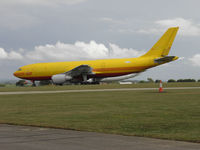 EI-OZA @ EGBP - Stored in DHL colours - by Manxman