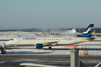 OH-LKM @ EFHK - Taken from inside Terminal 2. Note the snow blowing in the background - by Steve Hambleton