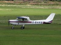 G-BHRB @ EGCB - Cessna 152 landing at Barton - by Manxman