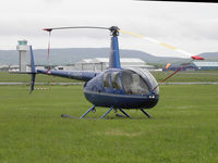 G-HHOG @ EGNS - R44 G-HHOG at the Aeroclub - by Manxman