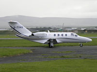 G-THNX @ EGNS - Cessna 525 G-THNX taxies out - by Manxman