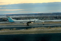 N154GA @ KBIL - Alpine Air Beech 1900 departing Billings Logan 1-21-2011 - by Daniel Ihde