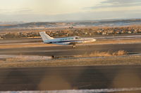 N2718Y @ KBIL - Cessna 402 taxi's to 28R Jan 21,2011 - by Daniel Ihde