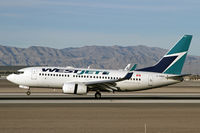 C-FWSY @ LAS - West Jet has several flights to Las Vegas daily - by Duncan Kirk