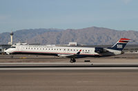 N918FJ @ LAS - Operated by Mesa Airlines - by Duncan Kirk