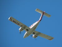 G-BZNN @ EGHH - Duchess in the overhead - by BIKE PILOT