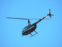 G-PROJ @ EGHH - R44 over flying the Flying Club - by BIKE PILOT