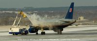 N851UA @ BWI - Being de-iced at BWI - by J.G. Handelman